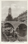 1677 Gezicht op de Oudegracht Tolsteegzijde te Utrecht met op de voorgrond de Hamburgerbrug en op de achtergrond de Domtoren.